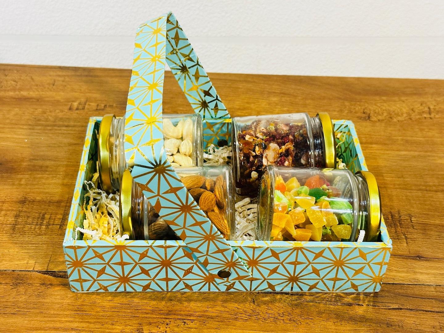 Dry fruit jars in a decorative tray